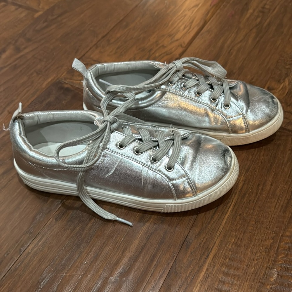 Silver tennis shoes